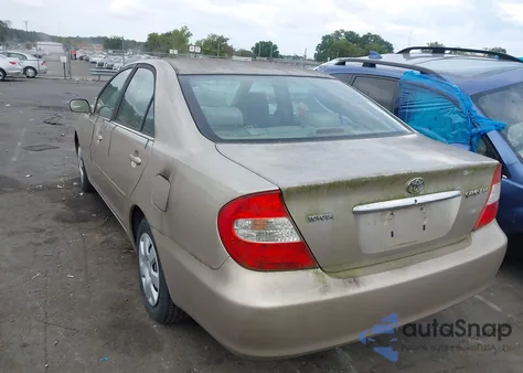 2004 Toyota Camry Le z USA, uszkodzony, nr VIN 4T1BE32K04U264646